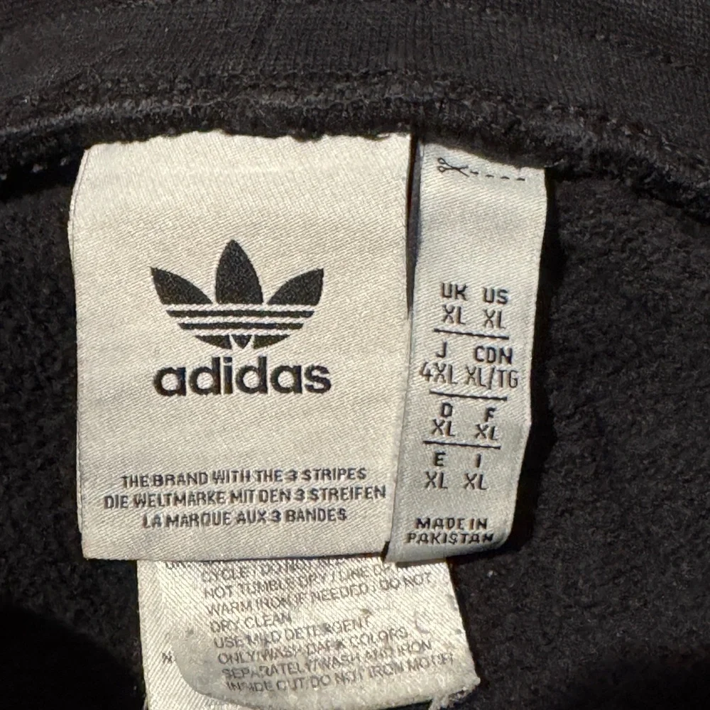 adidas Black Joggers with White Side Stripes and GT Patch